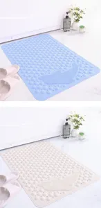 Non-slip bath mat with cute dolphin design, soft massage bumps and strong suction cups for safe shower.