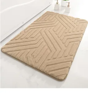 Faux rabbit hair bath mat with geometric diamond pattern, absorbent and non-slip for bathroom.