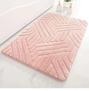 Pink faux rabbit fur bath mat, soft plush texture with geometric design, anti-slip backing.