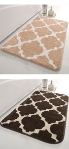 Plush bathroom floor mat set with absorbent coral fleece and anti-slip backing for home use.