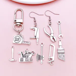 Antique silver hardware tool charms alloy DIY bracelet keychain jewelry accessories close up view
