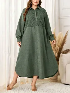 Plus size dark green long sleeve dress featuring detailed geometric lace chest panel and chic collar.