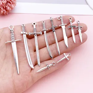 Antique silver alloy sword charms, dagger pendants for DIY handmade jewelry bracelets necklaces.