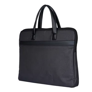 Borsa per laptop da lavoro nera resistente con manici in pelle e dettagli eleganti.