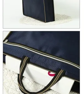 Close-up detail of the durable oxford cloth document bag zipper and reinforced handles, navy.