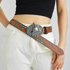 Western vintage turquoise embossed leather belt with unique cowboy hat metal buckle detail.