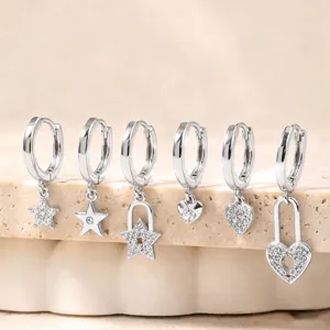 Silver hoop earrings set featuring crystal star and heart charms, elegant design jewelry for women