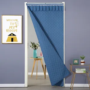 Thickened quilted door curtain detail view, thermal insulated fabric, cozy home decor.
