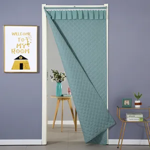 Thickened quilted winter door curtain detail, thermal windproof partition for bedroom use.
