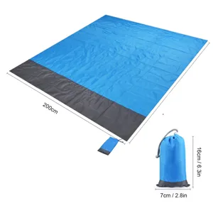 Waterproof outdoor picnic blanket detail showing 200cm size and portable storage pouch.