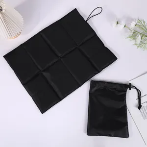 Portable foldable outdoor camping seat mat with waterproof oxford fabric and storage pouch.