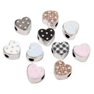 Acrylic heart loose beads with star prints and plaid designs, ideal for DIY phone chains and jewelry making.
