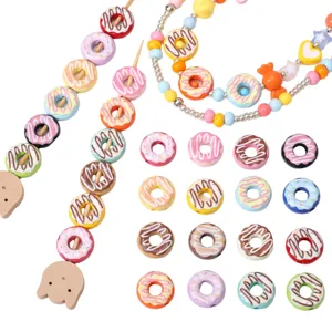 Detailed view of colorful acrylic donut beads, DIY jewelry accessories and cute charm bracelets.