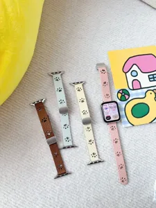 Bracelet de montre en cuir avec motif patte de chat et boucle déployante chic et tendance.