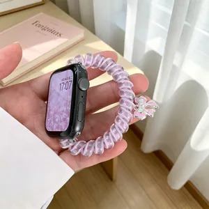 Cinturino per orologio a spirale viola con grazioso ciondolo a fiocco e glitter.