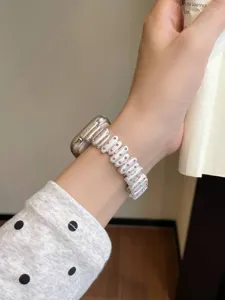 Replacement metal watch strap with pink rhinestones compatible for Apple Watch series.