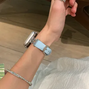 Elegant bow leather watch strap compatible with Apple Watch, stylish wrist accessory for daily wear.