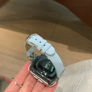 Leather metal bow watch band compatible with smart watch, elegant replacement strap.