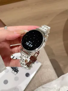 Stylish metal watch strap replacement with unique polka dot design compatible with smartwatches