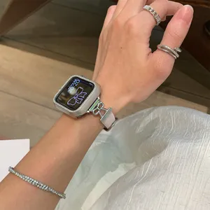 Detail view of bow leather metal watch band with rhinestone case compatible for Apple watch.