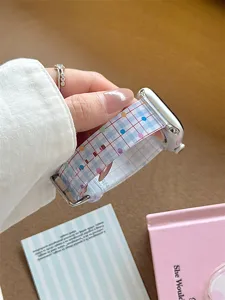 Transparent silicone watch strap with blue plaid and colorful dots, compatible with Apple watch.