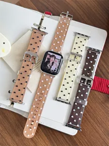 Detailed close-up of clear TPU silicone watch bands featuring cute heart patterns, smooth texture.