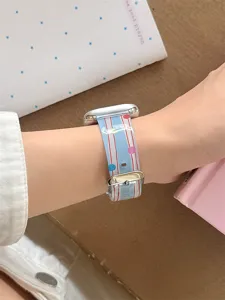 Silicone watch strap detail shot, cartoon doodle pattern with metal buckle, soft and durable.