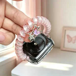 Bracelet de montre fil téléphonique rose avec de jolis charms papillon et étoile.