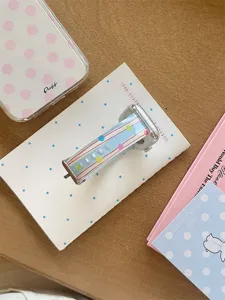 Silicone strap compatible with Apple Watch, colorful stripes and dots design, soft daily wear.