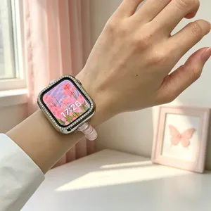 Bracelet de montre apple en fil téléphonique perlé rose chic avec étui de protection strass.