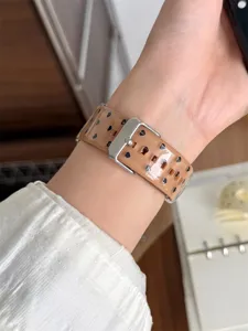 Clear TPU silicone watch strap with cute black heart print, compatible with Apple Watch.