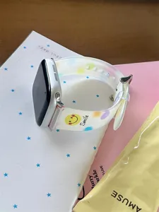 Colorful translucent silicone watch band compatible with Apple Watch, cartoon graffiti design.