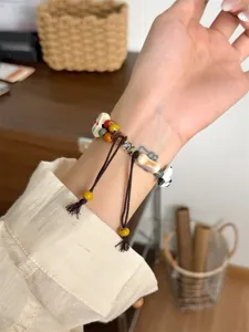 Bracelet de montre tissé en perles de céramique compatible avec Apple Watch, accessoire élégant.