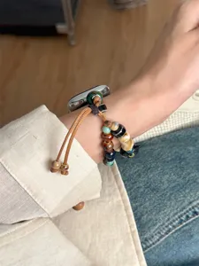 Bracelet de montre tressé en perles de céramique compatible Apple Watch, accessoire élégant.