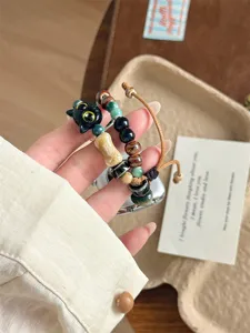 Bracelet de montre tressé en perles de céramique compatible avec montre connectée.