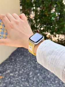 Cute silicone watch strap with bear and polka dots for Apple Watch, soft and stylish accessory.