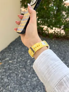 Cute polka dot silicone watch strap compatible with Apple Watch, stylish accessory.