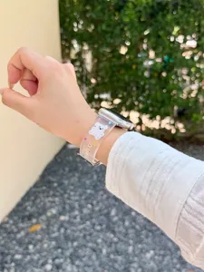 Clear silicone watch band strap detail with cute bear and colorful polka dots design.