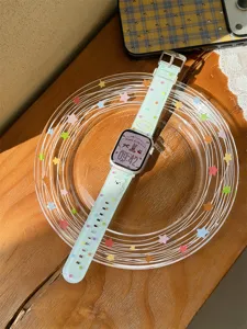 Cute polka dot silicone watch strap compatible with Apple Watch, soft and stylish accessory.