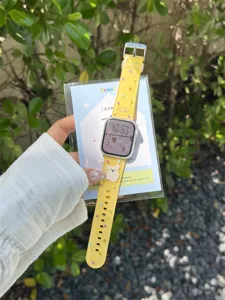 Silicone watch strap with cute polka dots and white bear charm detail for Apple watch.