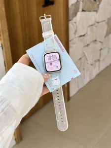 Cute polka dot silicone watch strap detail shot, clear texture and lovely bear decoration for watch.