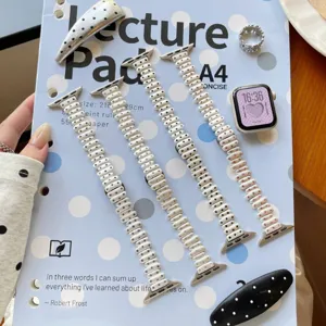 New stylish metal watch band with polka dot design for Apple Watch Series. Perfect accessory.