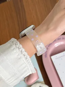Clear matte TPU watch band with purple heart pattern, detail view worn on wrist compatible with watch.