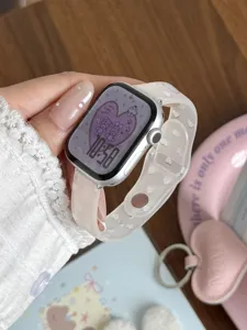 Detailed view of translucent TPU heart pattern watch strap compatible with Apple smartwatches.