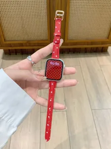 Red star leather watch band compatible with smart watch, stylish replacement strap accessory.