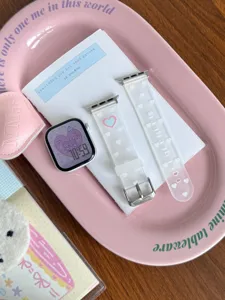 Detailed view of frosted TPU watch band with cute heart patterns and metal buckle.
