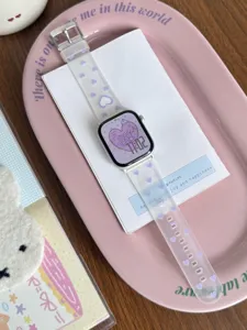 Transparent frosted TPU Apple Watch band featuring cute purple hearts, detailed view.