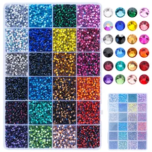 Detailed view showing the 24-compartment colorful rhinestone storage box and color swatches.