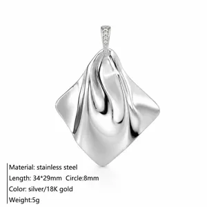 Stainless steel minimalist draped geometric pendant necklace detail, elegant metallic shine.