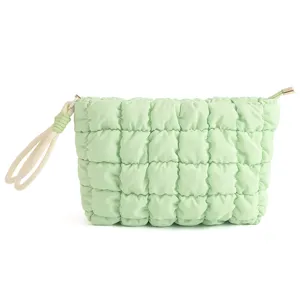 Mintgroene gewatteerde puffer make-up tas met handvat, draagbare cosmetische opbergtas.